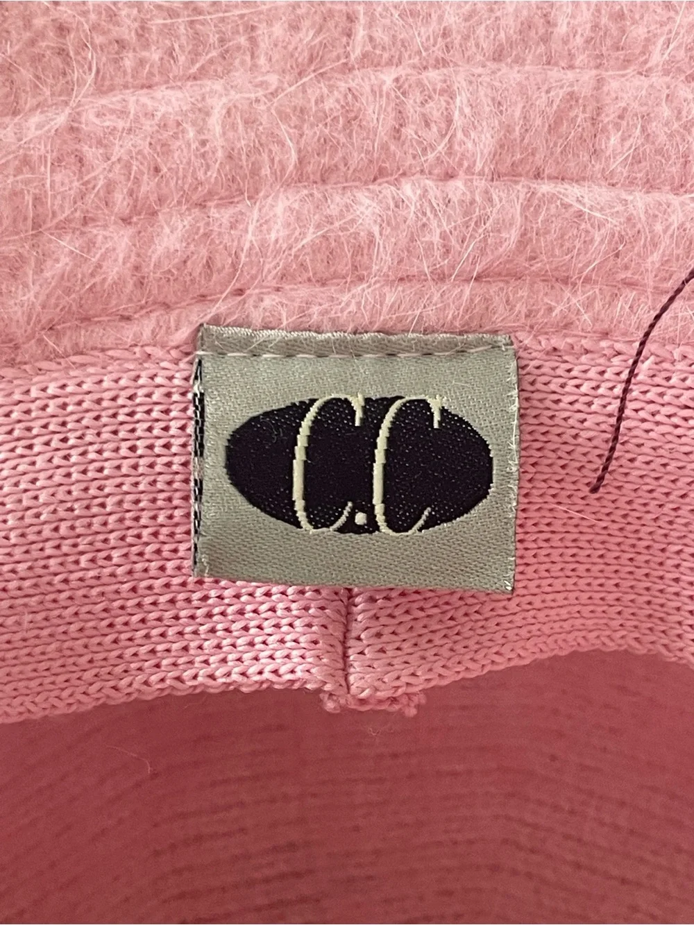 Pink C.C angora bucket hat with wispy fringe